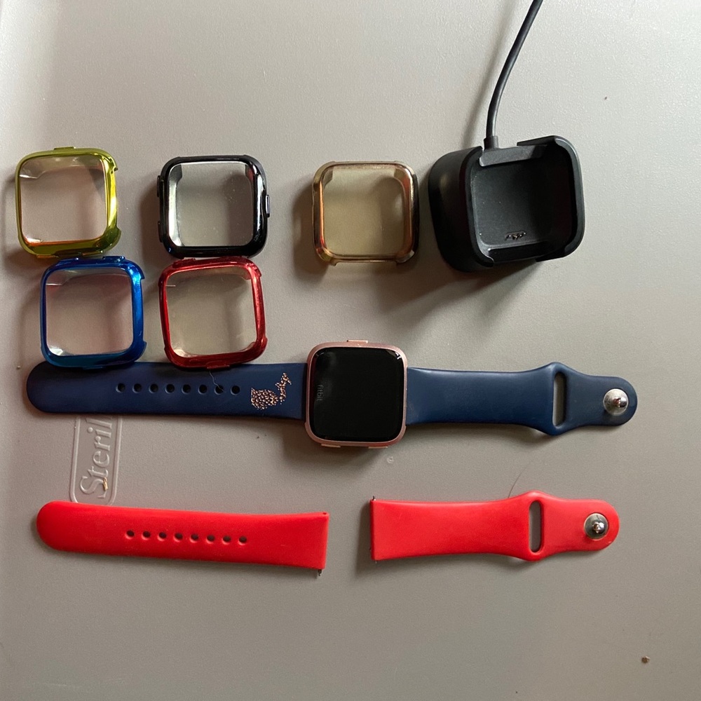 Fitbit Versa with screen covers and bands